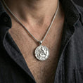 Load image into Gallery viewer, Polished silver winged Pegasus pendant necklace worn on neck, clean lifestyle framing, reflective shine and sharp relief