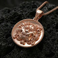 Load image into Gallery viewer, Rose gold plated guardian lion medallion pendant on volcanic rock, textured lava stone background, high-relief facial detail