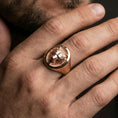 Load image into Gallery viewer, Rose gold plated bear signet ring worn on finger, lifestyle wear shot, warm plating tone and sculpted depth