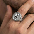 Load image into Gallery viewer, Polished silver elephant signet ring worn on finger, lifestyle hand shot, detailed elephant relief face with beaded border