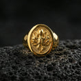 Load image into Gallery viewer, Gold plated octopus signet ring on volcanic rock, bold octopus symbol ring with textured recessed field and smooth bezel edge, premium macro lighting