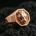 Load image into Gallery viewer, Rose gold plated lioness signet ring on volcanic rock, octagonal lioness crest ring with high-relief facial details and smooth bezel frame, luxury macro