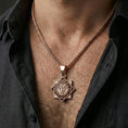 Load image into Gallery viewer, Rose gold plated Vishuddha pendant necklace worn on neck, lifestyle composition with dark clothing, crisp chakra silhouette
