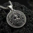 Load image into Gallery viewer, Oxidized Zeus pendant on textured volcanic rock, macro close-up, Greek mythology medallion with lightning detail, premium studio lighting