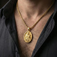 Load image into Gallery viewer, Gold plated Saint Joseph necklace pendant worn on neck, close-up lifestyle shot, luxury lighting with refined metallic highlights