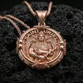 Load image into Gallery viewer, Rose gold plated Saint Uriel angel pendant on volcanic rock, premium macro product photo, sharp relief and decorative border