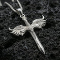 Load image into Gallery viewer, Polished silver Archangel Michael sword necklace pendant on black volcanic stone background, crisp feather wings and blade edge, high-end product shot