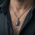 Load image into Gallery viewer, Oxidized lion head pendant necklace worn on neck, dark outfit lifestyle close-up, bold regal animal jewelry focus