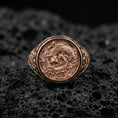Load image into Gallery viewer, Rose gold plated koi fish ring on volcanic rock, sharp macro product photo showcasing the round face with koi and flowing water design
