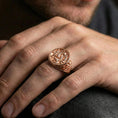 Load image into Gallery viewer, Rose gold plated koi fish ring on finger, close-up lifestyle photo showcasing the round bezel and intricate koi with water pattern