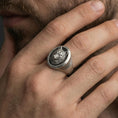 Load image into Gallery viewer, Oxidized wolf signet ring worn on finger, strong masculine profile and detailed animal face