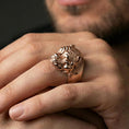 Load image into Gallery viewer, Rose gold plated bulldog ring on finger, close-up lifestyle photo showcasing the detailed bulldog head, collar rivets, and bold statement look