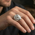 Load image into Gallery viewer, Polished silver lion ring on finger, natural hand pose highlighting the bold animal head silhouette and layered mane engraving