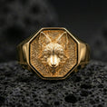 Load image into Gallery viewer, Detailed gold plated fox signet ring photographed on black volcanic stone with sharp focus and dramatic shadows