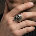 Load image into Gallery viewer, Oxidized sterling silver gorilla ring worn on a finger, showing the roaring ape face and bold sculpted depth