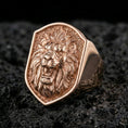 Load image into Gallery viewer, Rose gold plated lion signet ring on porous volcanic rock with premium studio contrast and detailed engraving