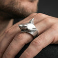 Load image into Gallery viewer, Oxidized sterling silver shark ring worn on a finger, side angle showing the open jaws and bold profile