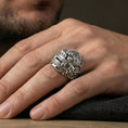 Load image into Gallery viewer, Balinese Barong god ring in polished silver finish on finger, heavy gothic mythology style, natural lifestyle wear shot