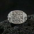 Load image into Gallery viewer, Jerusalem Cross signet ring in polished silver finish on volcanic rock, detailed faith cross motif with ornate texture, close-up photo