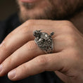 Load image into Gallery viewer, Dragon turtle ring in polished silver finish on finger, detailed scales and openwork band design, natural lifestyle wear shot