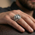 Load image into Gallery viewer, Fenrir wolf signet ring in polished silver finish on finger, Norse mythology wolf portrait design, natural lifestyle wear shot