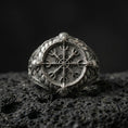 Load image into Gallery viewer, Sterling silver Vegvisir Viking compass signet ring in an oxidized finish on volcanic rock, Nordic protection symbol, macro studio shot