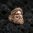 Load image into Gallery viewer, Rose gold plated Zeus signet ring with expressive face and refined sculptural texture, sharp close-up product photography on volcanic rock