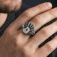 Load image into Gallery viewer, Oxidized sterling silver handprint signet ring worn on finger, skull band detail and dark fantasy emblem, lifestyle close-up