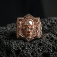 Load image into Gallery viewer, Rose gold plated skull signet ring on black volcanic stone, sculpted skull emblem, vintage gothic style