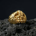 Load image into Gallery viewer, Gold plated dragon skull signet ring on black volcanic stone, mythical dragon over skulls, bold gothic design