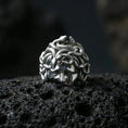 Load image into Gallery viewer, Polished sterling silver Medusa head ring on black volcanic stone, detailed snake crown and goddess face, mythological statement ring