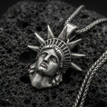 Load image into Gallery viewer, Oxidized sterling silver Statue of Liberty pendant on black volcanic stone, NYC skyline charm, braided chain necklace