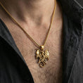 Load image into Gallery viewer, Gold plated pentagram dragon pendant necklace worn on neck, premium lifestyle composition, gothic star pendant with coiled dragon centerpiece