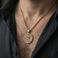 Load image into Gallery viewer, Rose gold plated Asian dragon pendant worn on neck, detailed engraving and textured relief, clean lifestyle framing with dark shirt contrast
