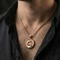 Load image into Gallery viewer, Rose gold plated Mortal Kombat dragon medallion worn on neck, raised dragon symbol charm on chain, sharp lifestyle crop with dark outfit contrast