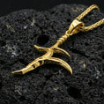 Load image into Gallery viewer, Gold plated black knife charm necklace on dark volcanic rock, Elden Ring inspired dagger pendant, premium macro lighting