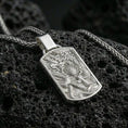 Load image into Gallery viewer, Polished silver dragon phoenix pendant necklace on porous volcanic stone, yin yang symbol relief, premium close-up