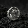 Load image into Gallery viewer, Oxidized sterling silver Our Lady of Guadalupe signet ring on volcanic rock, oval Virgin Mary relief, macro close-up
