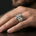 Load image into Gallery viewer, Polished silver Jesus Christ ring worn on finger, detailed Christ portrait, religious statement ring lifestyle close-up