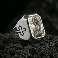 Load image into Gallery viewer, Polished silver Jesus Christ signet ring on porous volcanic stone, detailed Christ portrait, Christian prayer ring