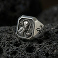 Load image into Gallery viewer, Oxidized sterling silver Saint Benedict signet ring on volcanic rock, engraved saint icon, cross shoulder detail