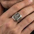 Load image into Gallery viewer, Oxidized sterling silver St Patrick ring worn on finger, bishop portrait relief with crozier, cross shoulder engraving