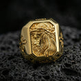 Load image into Gallery viewer, Gold plated Jesus Christ crown of thorns ring on dark volcanic rock, side-profile relief engraving, cross side details close-up