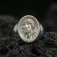 Load image into Gallery viewer, Polished silver Jesus portrait signet ring on volcanic stone, detailed Christian religious jewelry macro