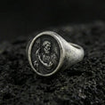 Load image into Gallery viewer, Oxidized 925 sterling silver Saint John the Baptist signet ring on volcanic rock, religious portrait relief, Catholic jewelry