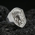 Load image into Gallery viewer, Polished silver Lord Ganesha signet ring on porous volcanic stone, detailed Ganesh engraving, spiritual statement ring