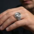 Load image into Gallery viewer, Polished silver St Michael signet ring worn on finger, detailed archangel relief, bold Christian protection jewelry