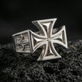 Load image into Gallery viewer, Polished silver iron cross ring on porous volcanic stone, sharp geometric cross design, heavy signet profile