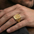 Load image into Gallery viewer, Gold plated INRI crucifix signet ring worn on finger, raised Jesus cross relief, bold religious statement accessory