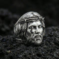 Load image into Gallery viewer, Polished silver Jesus crown of thorns ring on porous volcanic stone, detailed Christ face sculpt, bold Christian ring